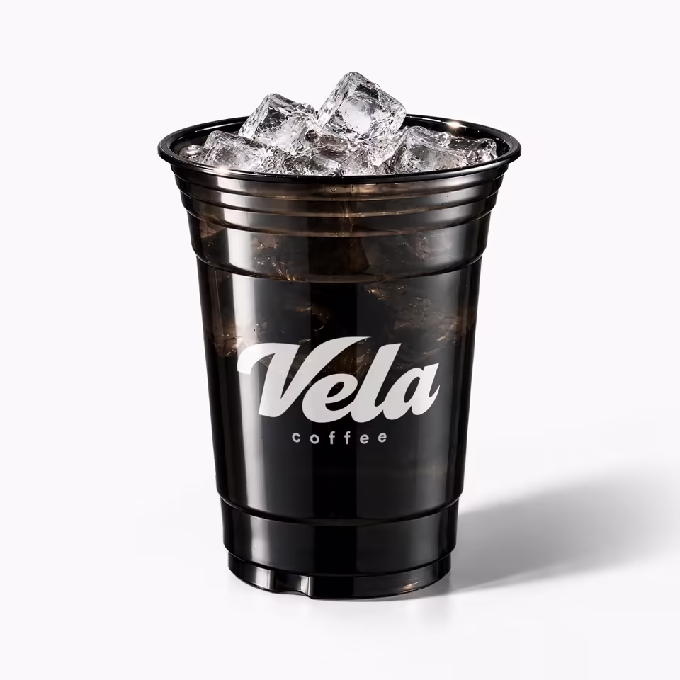 Custom black PET cold cup with printed brand logo and ice