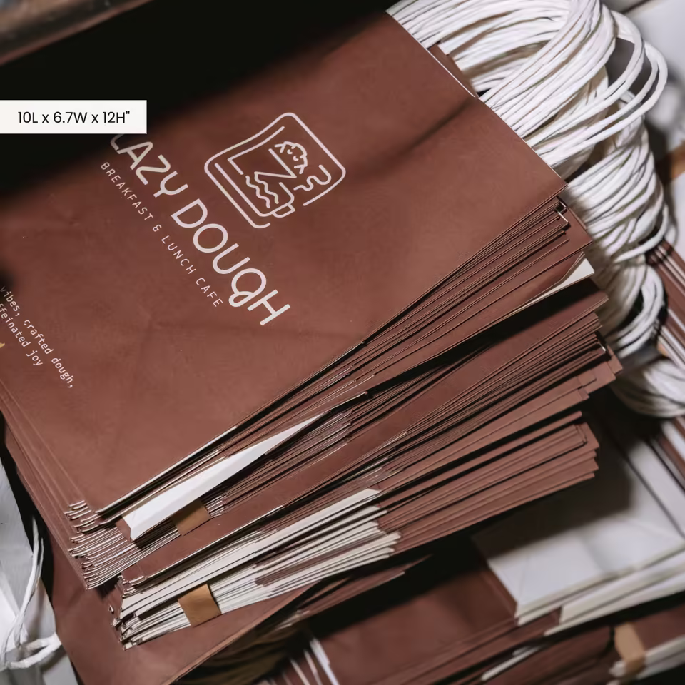 Brown Kraft Paper Bag With Twisted Handles And Logo